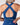 Blue sports bra with criss-cross back design on a plain background