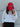 Person wearing a white sweatshirt and red cap with 'LINCOLN Ladies' text against a gray wall.