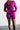 Person wearing a purple athletic outfit on a plain background