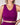 Person wearing a purple athletic outfit against a plain background